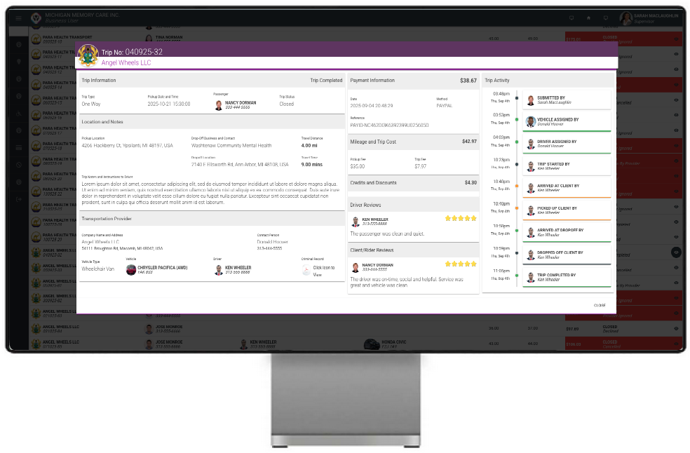 NEMT trip details and activity screen on desktop monitor