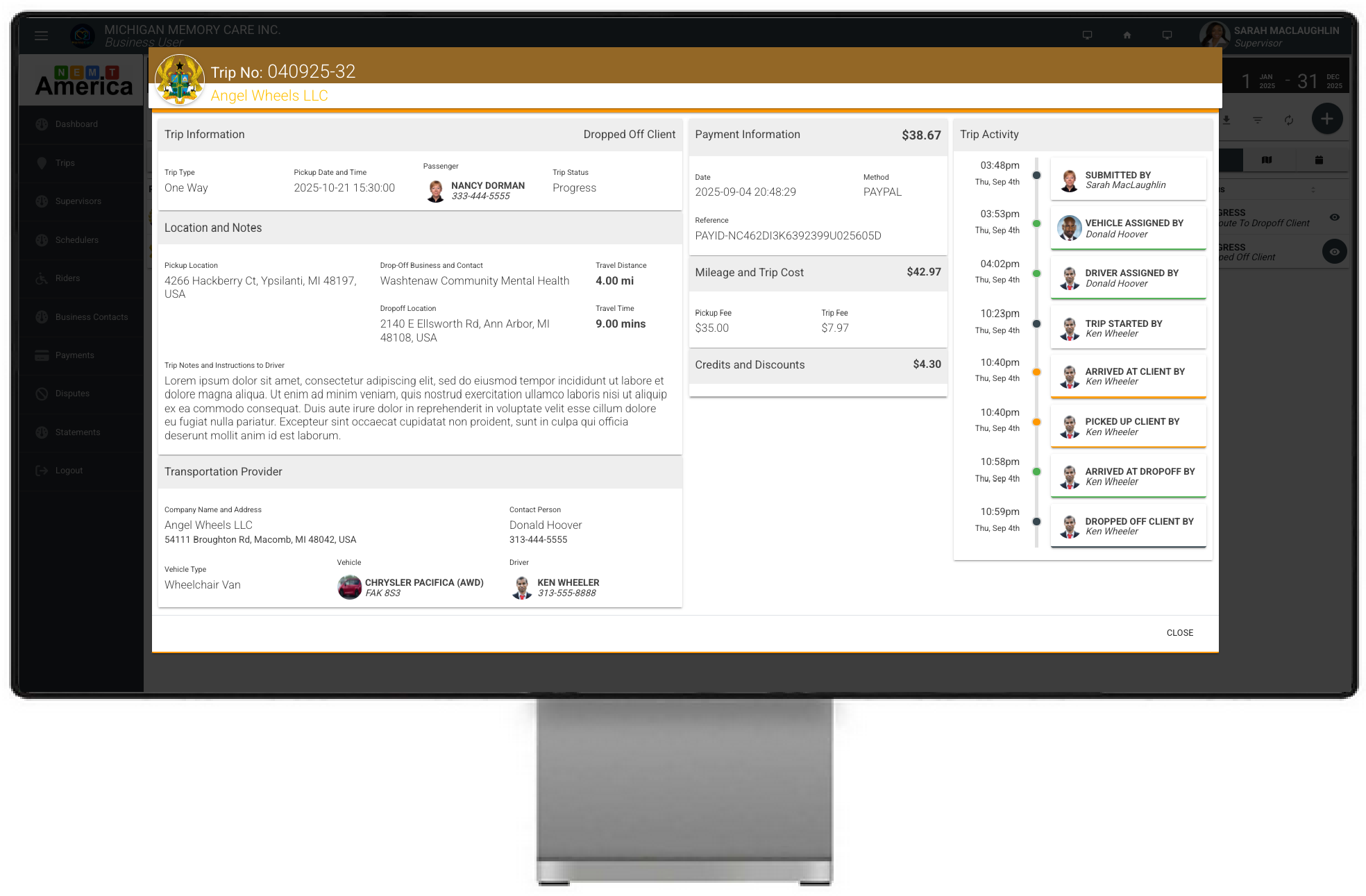 NEMT trip workflow screen on desktop monitor